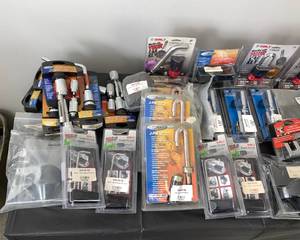 lot 1 image: Bulk Lot of Trailer and Towing Security Devices