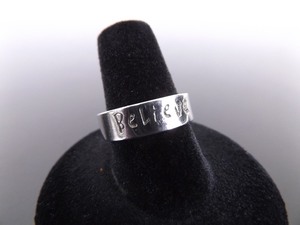 lot 64 image: .925 Sterling Silver Believe Band Ring Size 8