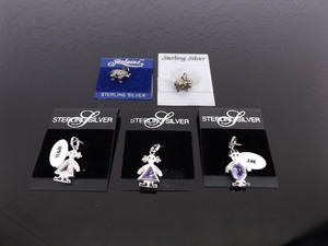 lot 19 image: 5 NEW .925 Sterling Silver Charms