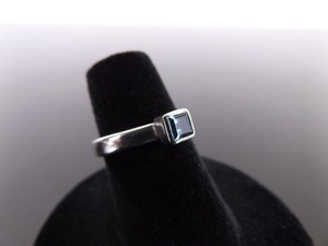 lot 22 image: .925 Sterling Silver Square Cut Blue Topaz Ring Size 5.25