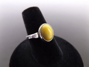 lot 30 image: .925 Sterling Silver Egg Yolk Amber Cabochon Ring Size 7.5