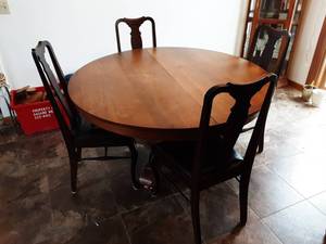 lot 1 image: 54 Round Pedestal Table On Casters With 5-Vintage Wood Chairs