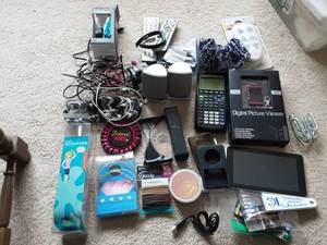 lot 21 image: Tablet, Graphing Calculator, Remotes, Vivo Fit, Small Electronics