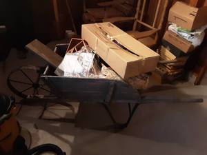 lot 125 image: Vintage Steel Wheel Barrow & Contents (Decor), Scarecrow, Old Wood Skis