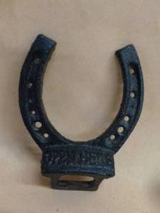 lot 149 image: Cast Iron Bottle Opener