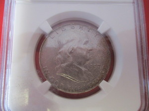 NGC Certified 1957 P (Philadelphia Mint) Mint State MS 65 Franklin Silver Half Dollar.