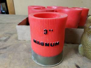 lot 56 image: Shotgun Shell and Fish Can Coolies