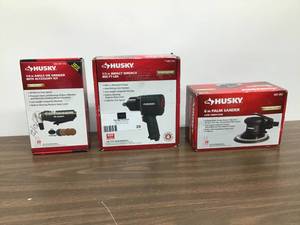 lot 29 image: Mixed Lot Of 3 Husky Air Tools Palm Sander, 14 In Angle Grinder, 12 In Impact