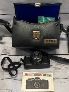 lot 19 image: Pentax Auto 110 Camera w Case & Lenses