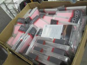 lot 66 image: Box of Gooey iPhone 66s Phone Case...