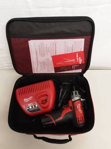lot 3 image: Milwaukee Heavy Duty 12 Volt Compact Driver With Battery, Charger & Case