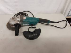 lot 8 image: Makita 7 Inch Angle Grinder GA7021