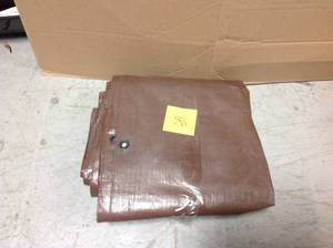 lot 86 image: Everbilt 12 ft. x 16 ft. Heavy Duty BrownSilver Tarp &nbspin good condition