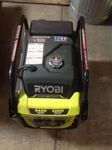 RYOBI 4000-Watt Gasoline Powered Digital Inverter Generator in working conditions missing wheels