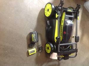 lot 103 image: RYOBI 20 in. 40-Volt Brushless Lithium-Ion Cordless Battery Self Propelled Lawn Mower with 6.0 Ah Battery and Charger Included