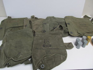 lot 65 image: Lot of 7 Vintage US Military Gas Mask Satchels