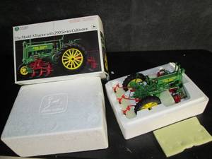 lot 5 image: Ertl Precision Classics The Model A John Deere Tractor With 290 Service Cultivator 116 Scale # 5633 PLT