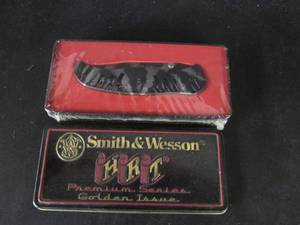 lot 113 image: Smith & Wesson Premium Series Golde...