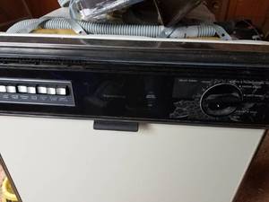 lot 52 image: Dishwasher, Microwave, and a Stove Vent System