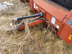 lot 57 image: Hesston 565T & Case IH 8460 Round Baler
