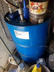 lot 102 image: Dead Batteries and 55 Gallon Drum