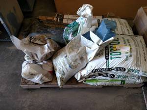lot 35 image: Top Soil, Sand, Stakes, & Misc....