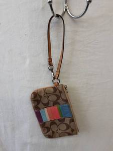 lot 26 image: Coach Signature Wristlet