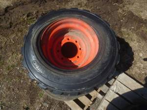 lot 19 image: Skid Steer TiresRims Solid Deal, Solitek