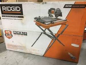 RIDGID 9 Amp Corded 7 in. Wet Tile Saw with Stand in working conditions