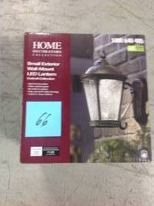 lot 66 image: Aged Bronze Patina Outdoor LED Wall Lantern Sconce by Home Decorators Collection