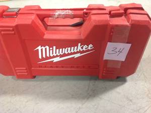 lot 34 image: Milwaukee  SAWZALL Reciprocating Saw corded used in working conditions