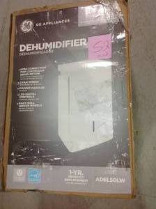 lot 52 image: GE 50 pt. Dehumidifier used in working conditions
