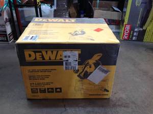 lot 104 image: DEWALT 15 Amp Corded 12 in. Compound Double Bevel Miter Saw not used