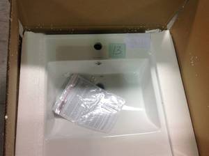 lot 13 image: Swiss Madison Voltaire 25 in. Vanity Top in Glossy White with 1-Basin not used