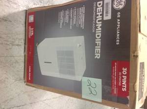 lot 22 image: GE 30 pt. Dehumidifier open box in good condition
