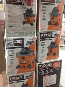 lot 33 image: Pallet of assorted Ridgid Vacuums various models and conditions some may be missing pieces