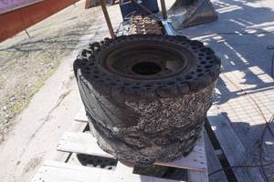 Set of 4 - Solid Rubber Skid Loader Tires On 8 Bolt Rims