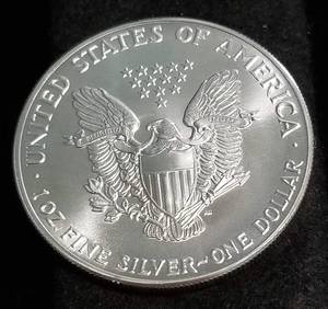 1986 AMERICAN SILVER EAGLE 1 TROY OZ. .999 FINE SILVER DOLLAR