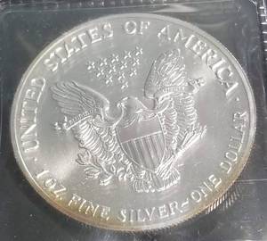 1989 AMERICAN SILVER EAGLE 1 TROY OZ. .999 FINE SILVER DOLLAR
