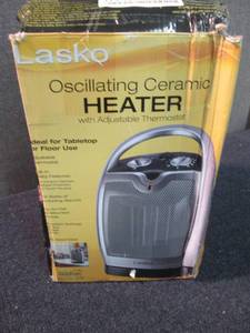 lot 15 image: Lasko Oscillating Ceramic Heater, t...