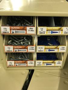 Cabinet with Assort Lag screws and plastic Anchors
