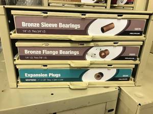 Cabinet with Assort Bronze Bearings and Expansion Plugs
