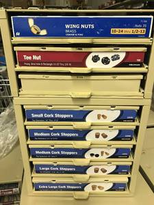 Double cabinet with assort nuts and cork stoppers