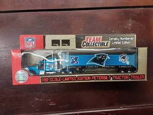 lot 4 image: Panthers Collectible NFL Limited Edition Peterbilt 180 Scale