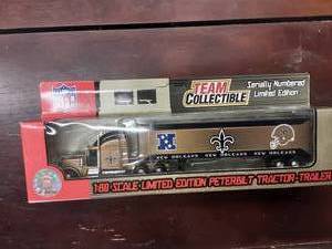 lot 9 image: Saints Collectible NFL Limited Edition Peterbilt 180 Scale