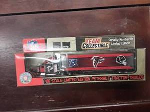 lot 11 image: Falcons Collectible NFL Limited Edition Peterbilt 180 Scale