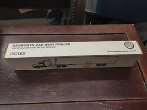 lot 43 image: Ertl 164 Scale Die Cast Kenworth Cab & Trailer