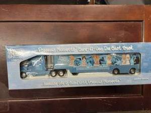 lot 55 image: Precious Moments Care-A-Van Die Cast Truck