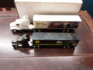 lot 73 image: 2-John Deere Semi Tractor Trailers