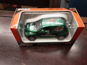 lot 77 image: White Rose Collectibles 124 Scale PT Cruiser